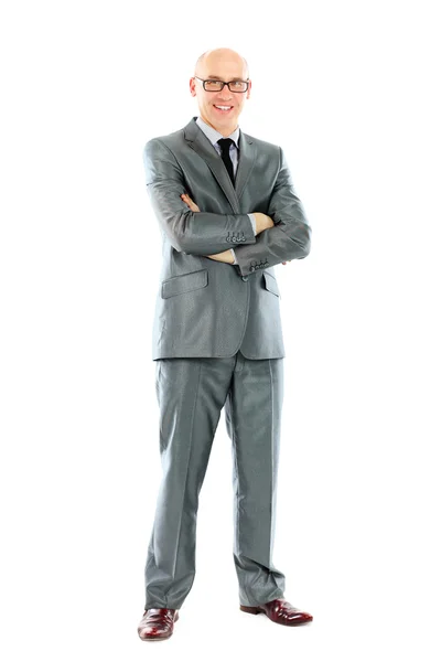 Молодой бизнесмен стоит с поднятыми руками — стоковое фото