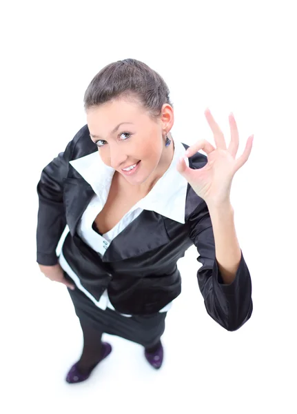 Top view of a happy young business woman making ok sign — Stock Photo, Image