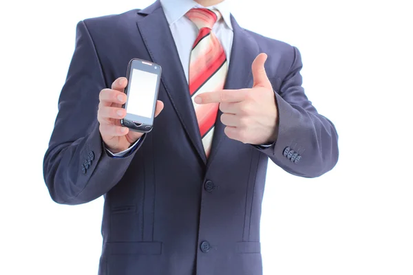 Empresario mostrando y entregando un teléfono móvil . — Foto de Stock