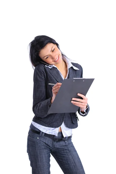Smiling business woman writing in clipboard — Stock Photo, Image