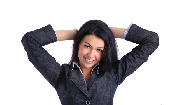Tevreden zakenvrouw met handen achter haar hoofd gekruist — Stockfoto
