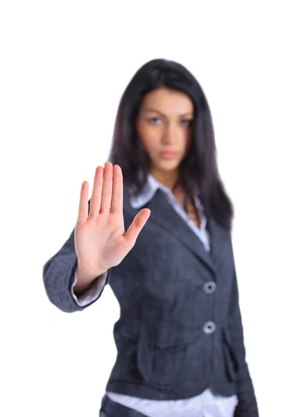 Sério mulher de negócios fazendo parar sinal sobre branco, foco na mão — Fotografia de Stock