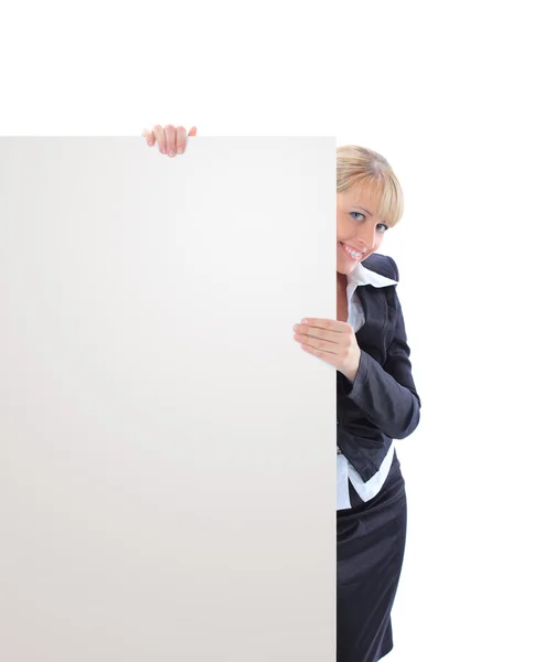 Happy blond business woman showing blank signboard, isolated on white background — Stock Photo, Image