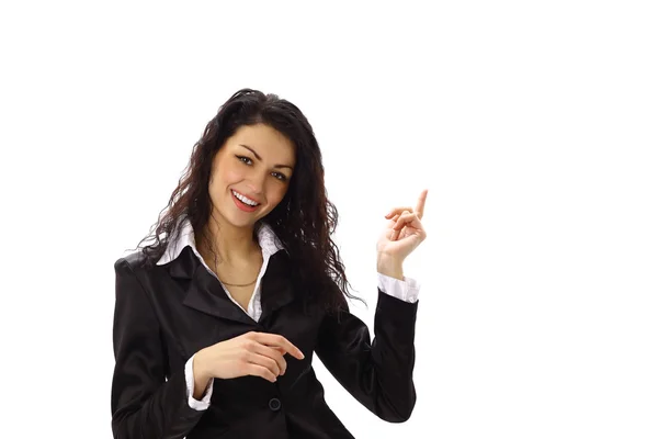 Feliz joven mujer de negocios señalando algo interesante contra el fondo blanco — Foto de Stock