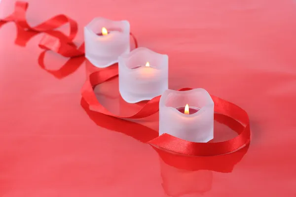 Close-up of valentine candles with ribbon — Stock Photo, Image