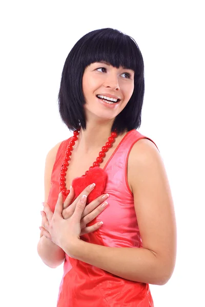 Aantrekkelijke lachende vrouw geïsoleerd op wit met hart — Stockfoto