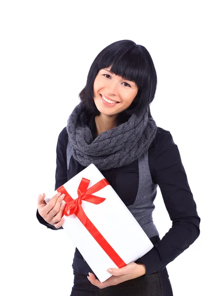 Beautiful business woman holding a gift — Stock Photo, Image