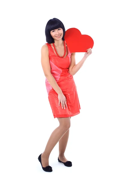 Young happy smiling woman with heart symbol — Stock Photo, Image
