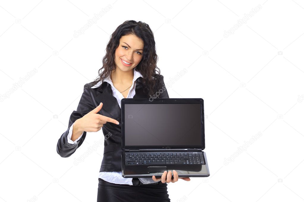 Brunette young businesswoman showing a laptop screen with copyspace