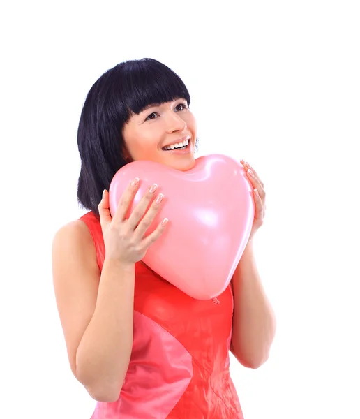 Beyaz kalp balon ile izole çekici gülümseyen kadın — Stok fotoğraf