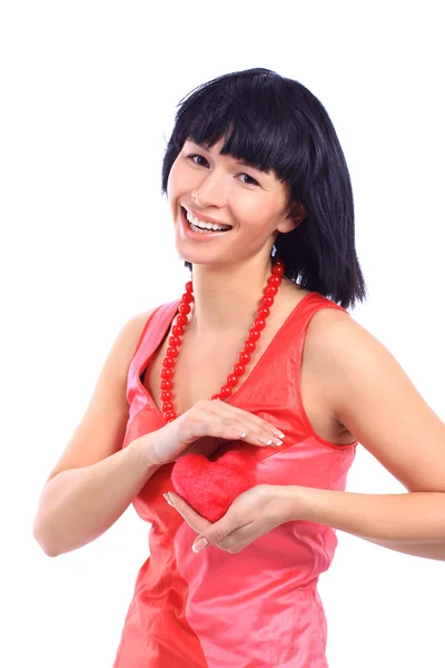 Attraente donna sorridente isolata su bianco con cuore — Foto Stock