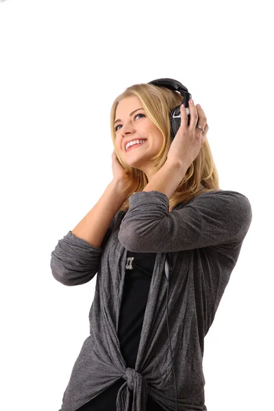 Frau hört Musik. isoliert auf weißem Hintergrund — Stockfoto