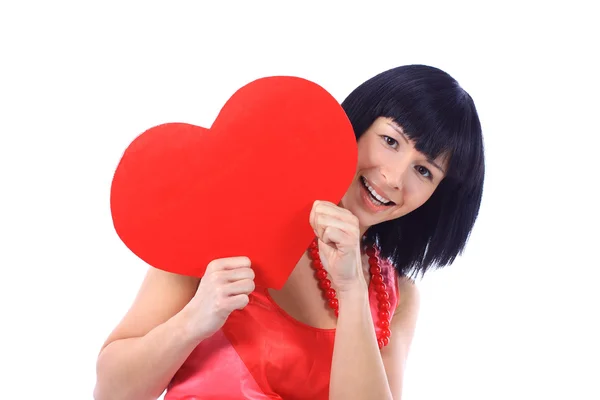 Young happy smiling woman with heart symbol, isolated — Stock Photo, Image