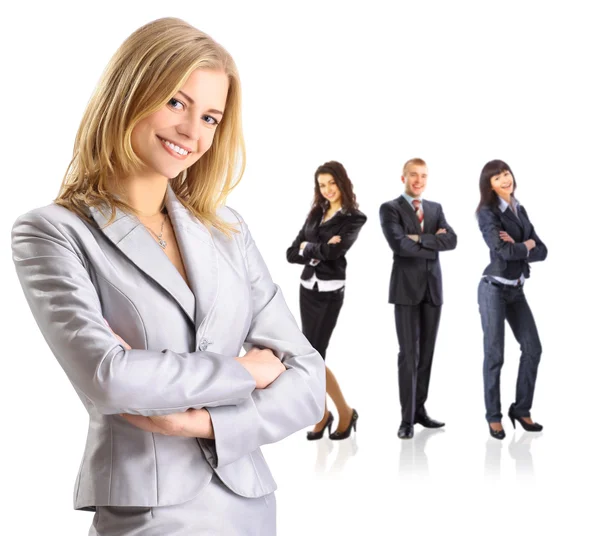 Kvinnliga business leader stående framför hennes team — Stockfoto