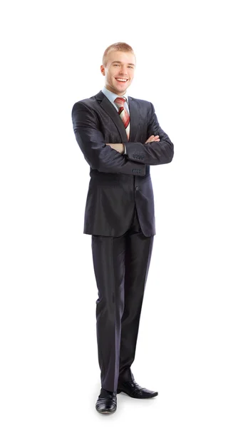 Ritratto completo di un giovane uomo d'affari in piedi con le mani in mano — Foto Stock