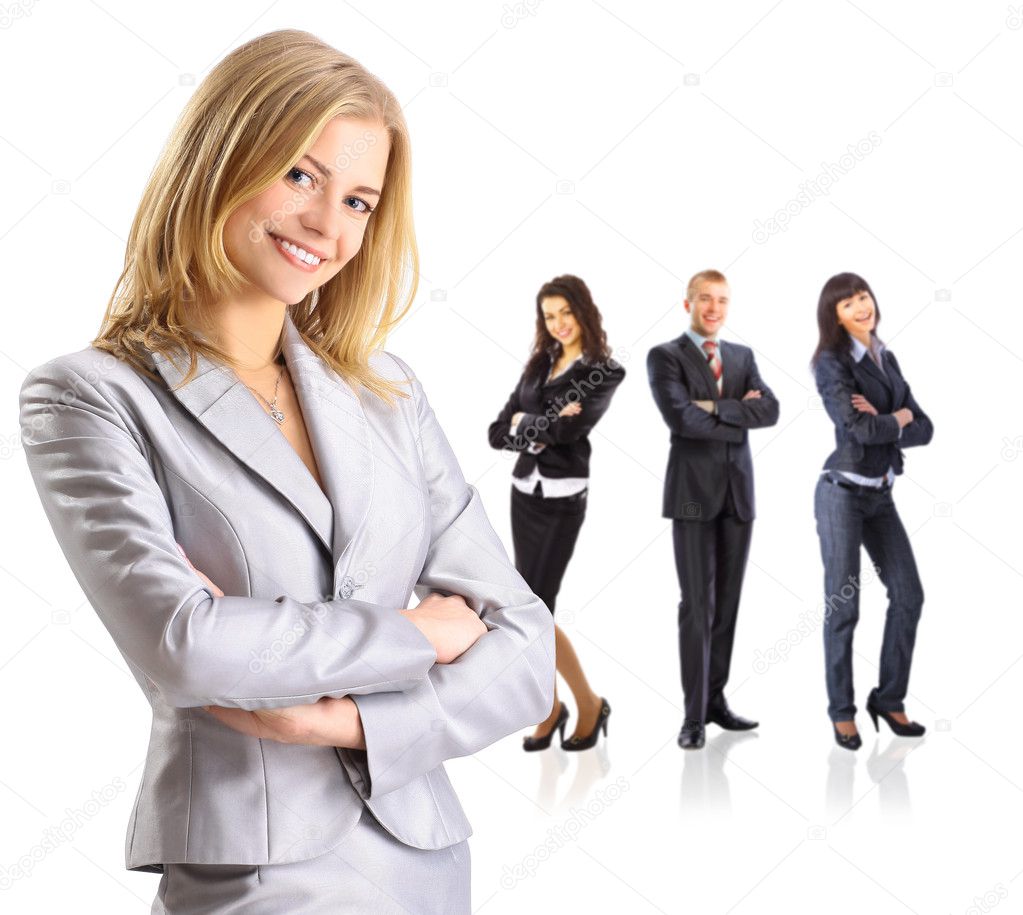 Female Business leader standing in front of her team