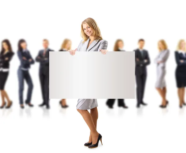 Business woman and group holding a banner ad — Stock Photo, Image