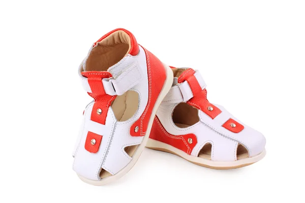 Par de sapatos de bebê sobre um fundo branco — Fotografia de Stock
