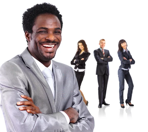 Africano homem de negócios em um fundo branco com sua equipe — Fotografia de Stock