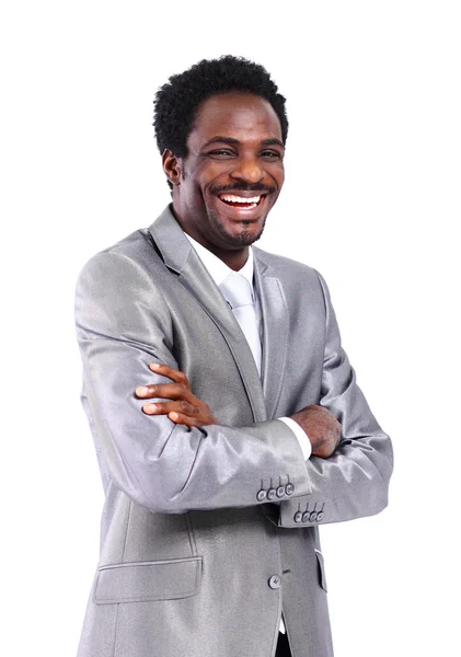 Portrait of a satisfied young African American business man with hands folded on white — Stock Photo, Image