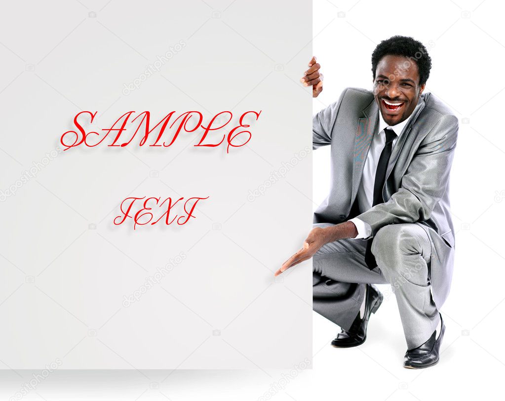 Black businessman showing blank signboard, isolated on white background