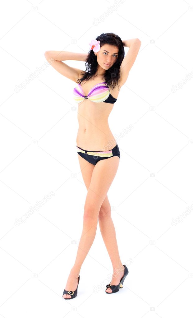 Sexy beautiful brunette woman in summer swimsuit bikini