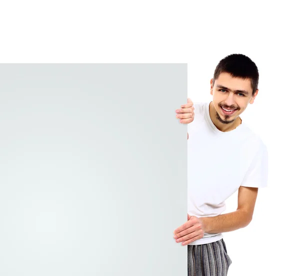 Šťastný usměvavý pohledný muž s transparentem. izolované na bílém pozadí. — Stock fotografie