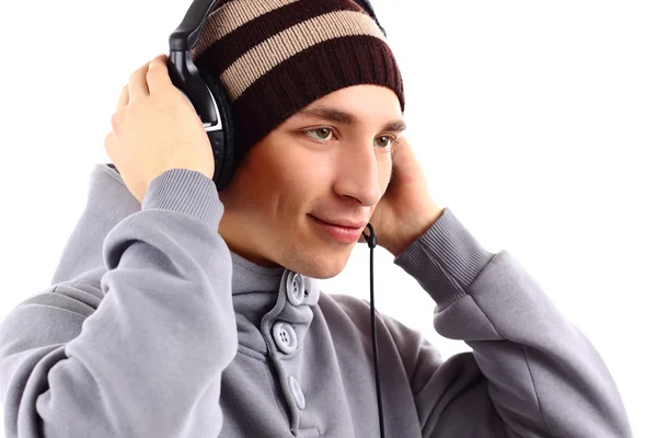Giovane con le cuffie ascoltare musica — Foto Stock