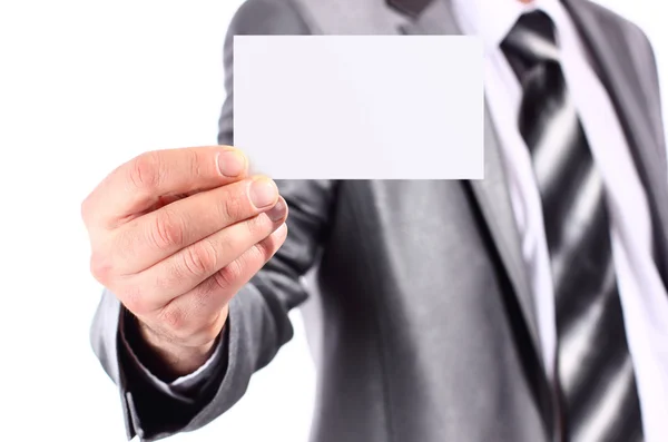 Homem de negócios entregando um cartão de visita em branco isolado — Fotografia de Stock