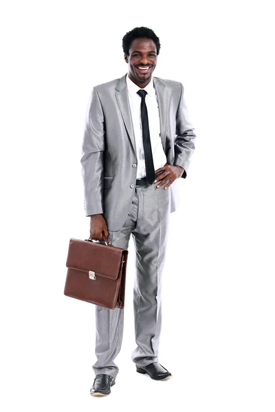 Handsome young african businessman with briefcase — Stock Photo, Image