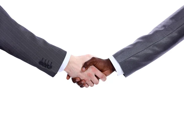 Африканский бизнесмен пожимает руку белому бизнесмену — стоковое фото