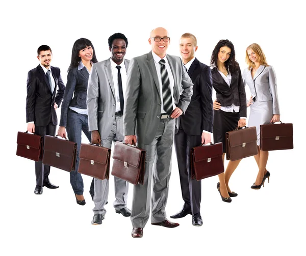 Zespół firmy spośród młodych mężczyzn i kobiet biznesu z walizką — Zdjęcie stockowe