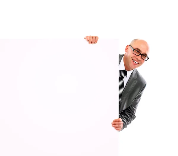 Homem de negócios mostrando placa em branco — Fotografia de Stock
