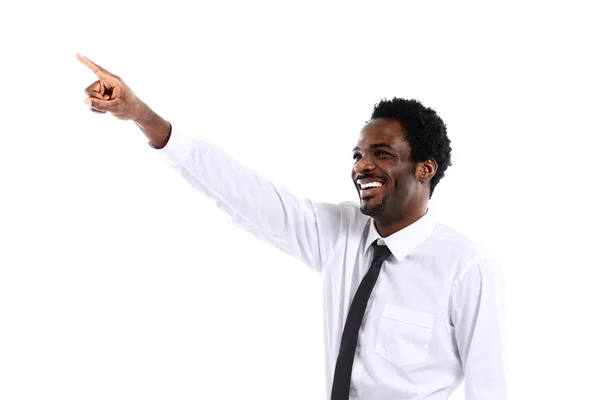 Empresário africano apresentando algo imaginário sobre branco — Fotografia de Stock