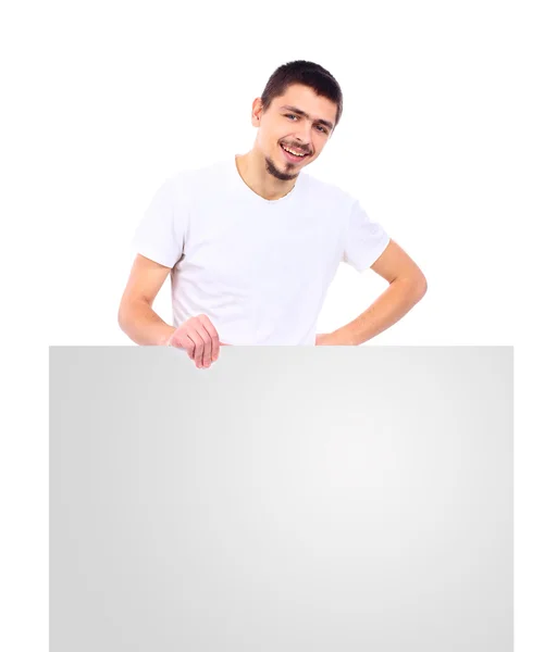 Loseup zadowolony mężczyzna stojący biały puste karty — Zdjęcie stockowe