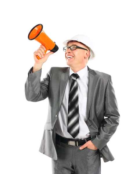 Homme d'affaires criant à travers un mégaphone sur fond blanc — Photo