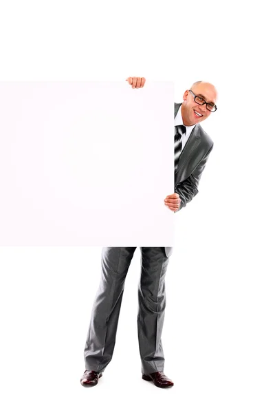 幸せな笑顔若いビジネス男空白の看板を示す — ストック写真