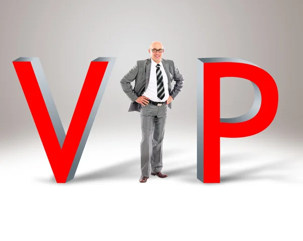 Joven hombre de negocios en medio de la palabra 'vip' — Foto de Stock