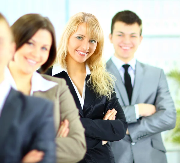 Close up portrait of young businesswoman with her collegues on background — Stock Photo, Image