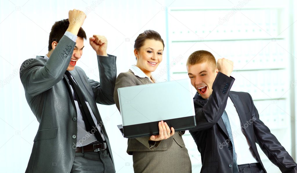 Businesswoman with her collegues using laptop