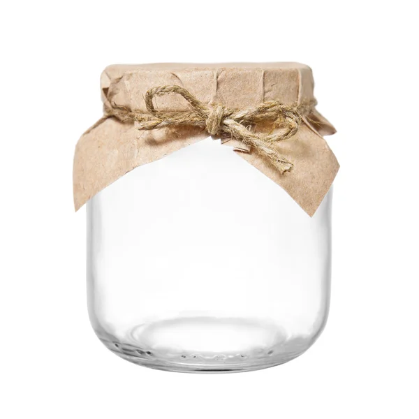 Lege glazen pot met verpakking papier en touw — Stockfoto