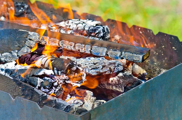 Firewood in the brazier — Stock Photo, Image