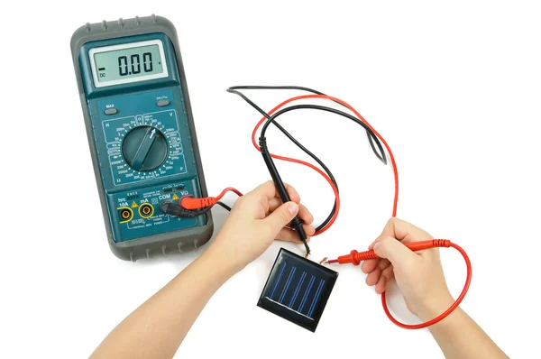 Electronic tester and solar battery — Stock Photo, Image