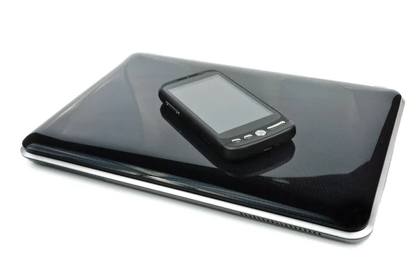 Ordenador portátil y teléfono de pantalla táctil — Foto de Stock