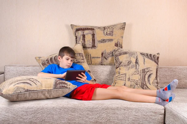 stock image Boy with a Tablet PC