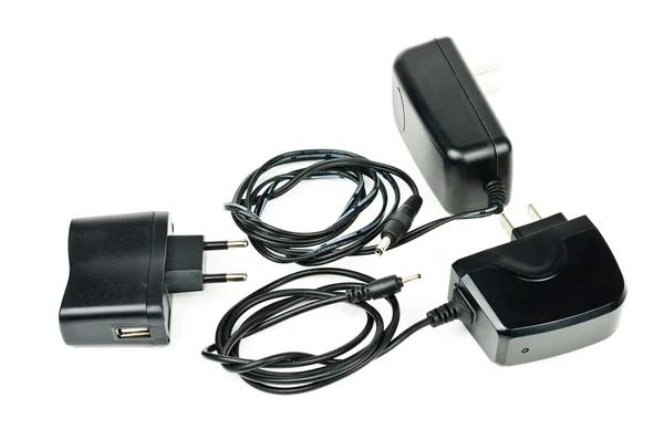 AC adapter for charging the phone — Stock Photo, Image
