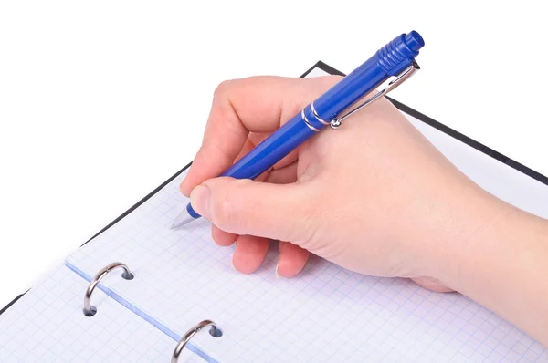 ボールペンのペンで手をノートに書き込みます — ストック写真