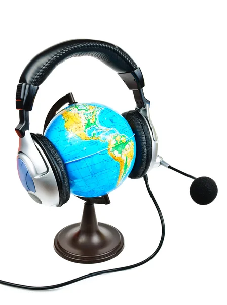 Globe met koptelefoon — Stockfoto