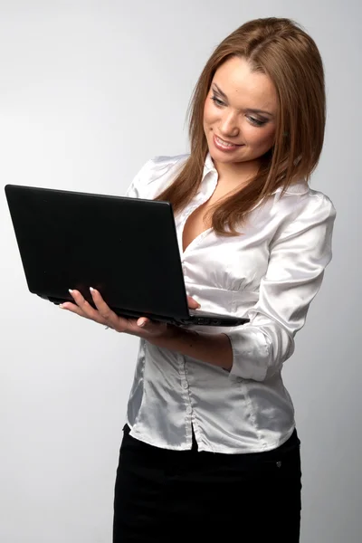 Woman with laptop Royalty Free Stock Images