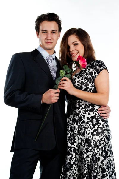 Man gives a woman flowers — Stock Photo, Image